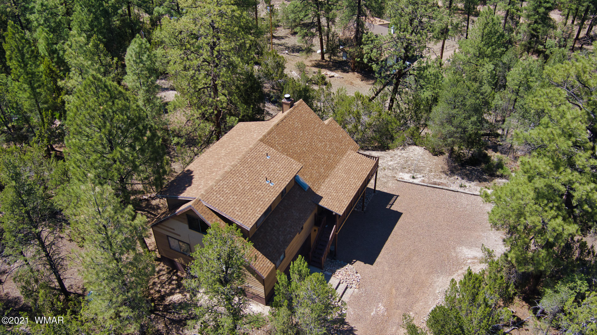 1910 Ridge Road Heber, AZ 85928 - Photo 15 of 39 an aerial view of a house with a yard and wooden fence