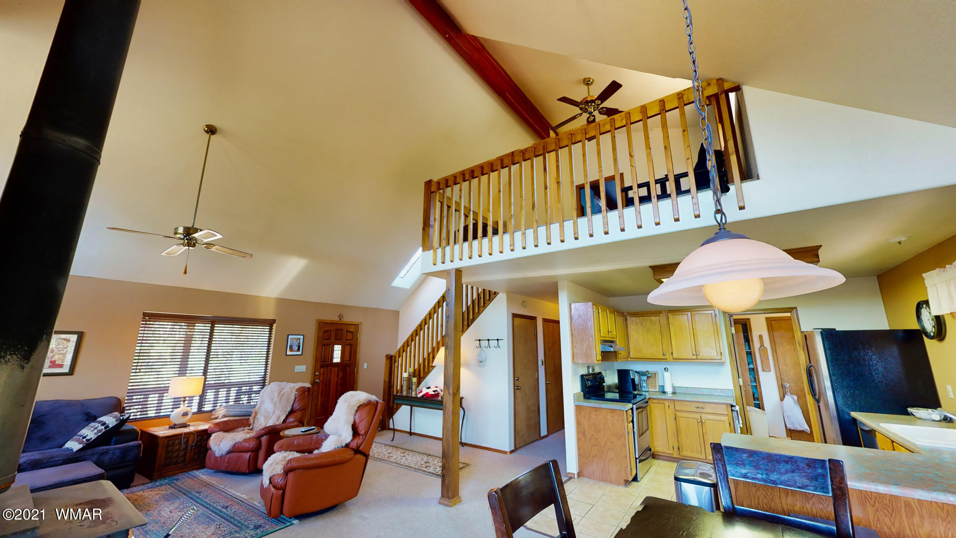 1910 Ridge Road Heber, AZ 85928 - Photo 18 of 39 a bedroom with furniture and a chandelier