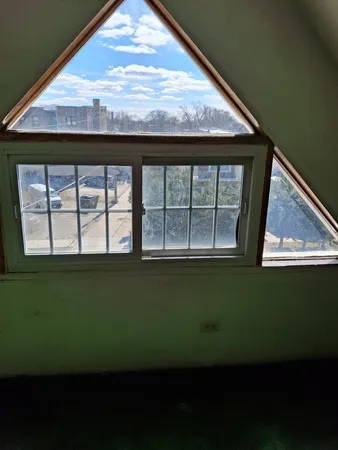 a view of a large window with an outdoor space