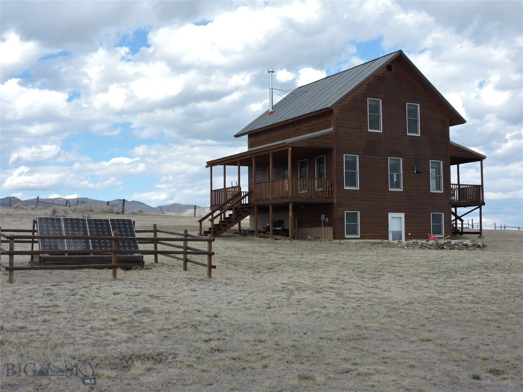 385 Melrose Road Twin Bridges, MT 59754 - Photo 1 of 1 Solar Panels behind the house