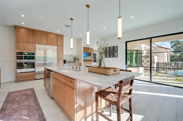 a view of a livingroom with washer and dryer