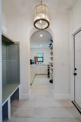 a bathroom with a double vanity sink mirror and shower