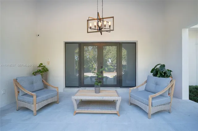 a living room with furniture and a couch