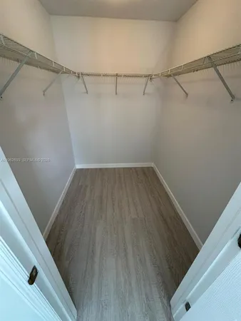 a view of a room with racks on the wall