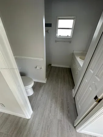 a view of entryway with wooden floor