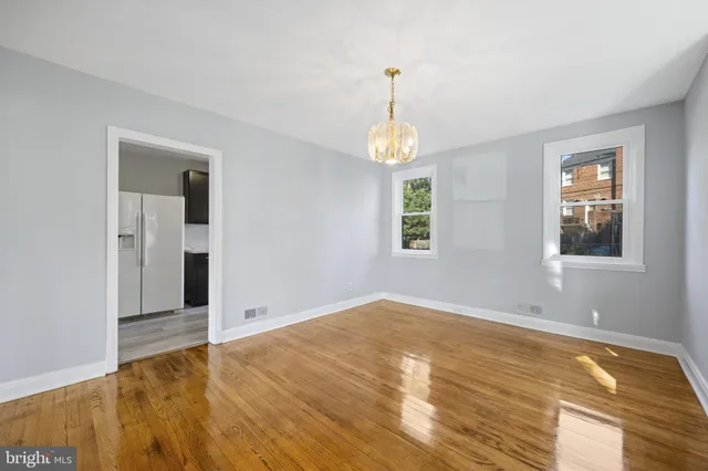 a view of an empty room and window