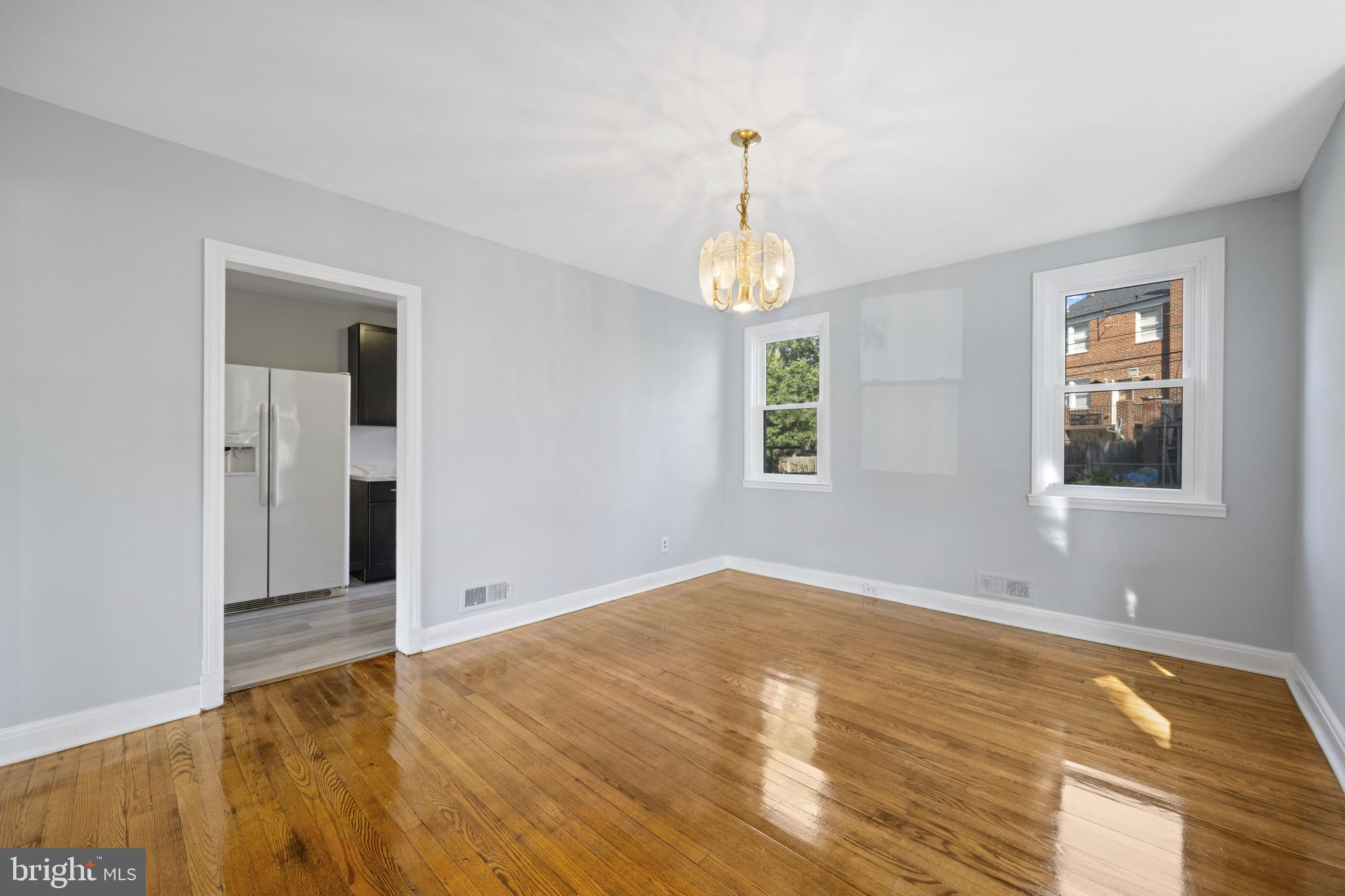 1516 East 36th Street Baltimore, MD 21218 - Photo 8 of 33 a view of an empty room and window