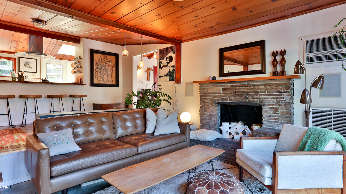 9525 Reverie Road Tujunga, CA 91042 - Photo 1 of 47 a living room with furniture and a fireplace