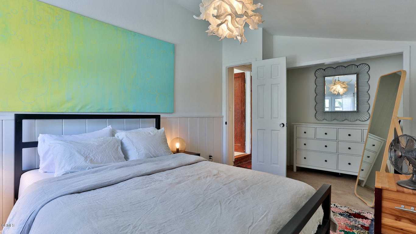 9525 Reverie Road Tujunga, CA 91042 - Photo 17 of 47 a bedroom with a bed and a dresser