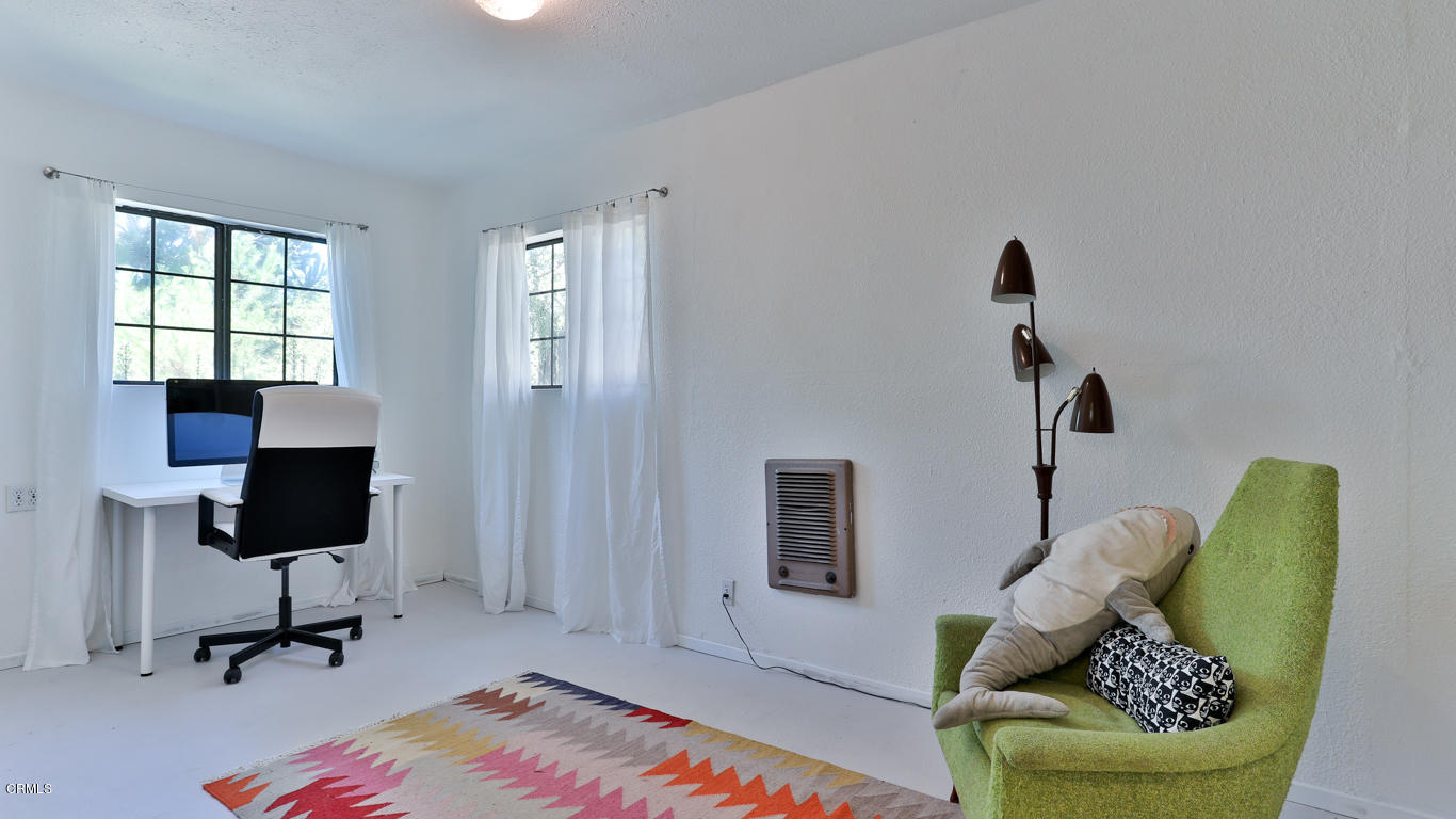 9525 Reverie Road Tujunga, CA 91042 - Photo 26 of 47 a living room with furniture and a wooden floor
