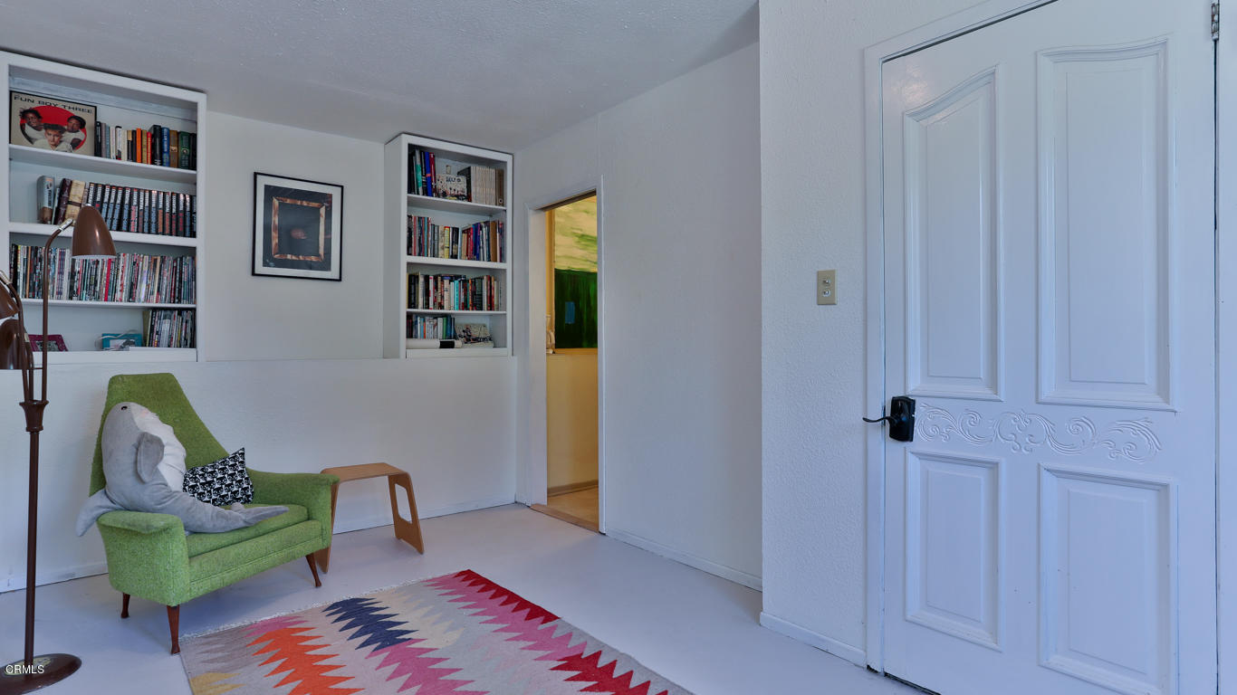 9525 Reverie Road Tujunga, CA 91042 - Photo 27 of 47 a living room with furniture and a wooden floor