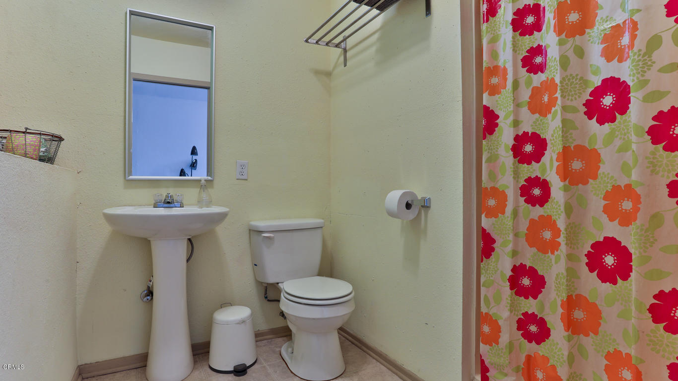 9525 Reverie Road Tujunga, CA 91042 - Photo 30 of 47 a bathroom with a sink toilet and shower