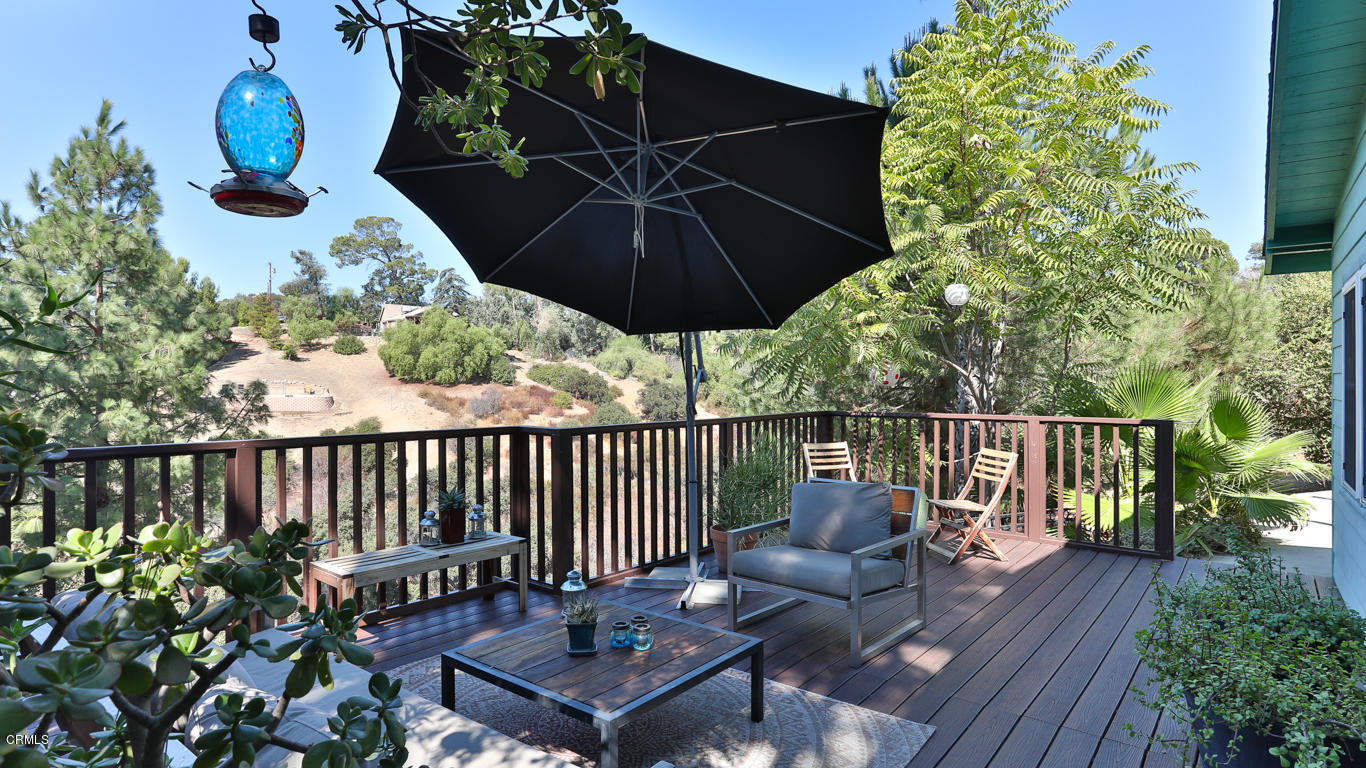 9525 Reverie Road Tujunga, CA 91042 - Photo 34 of 47 a view of a chairs and table on the wooden floor