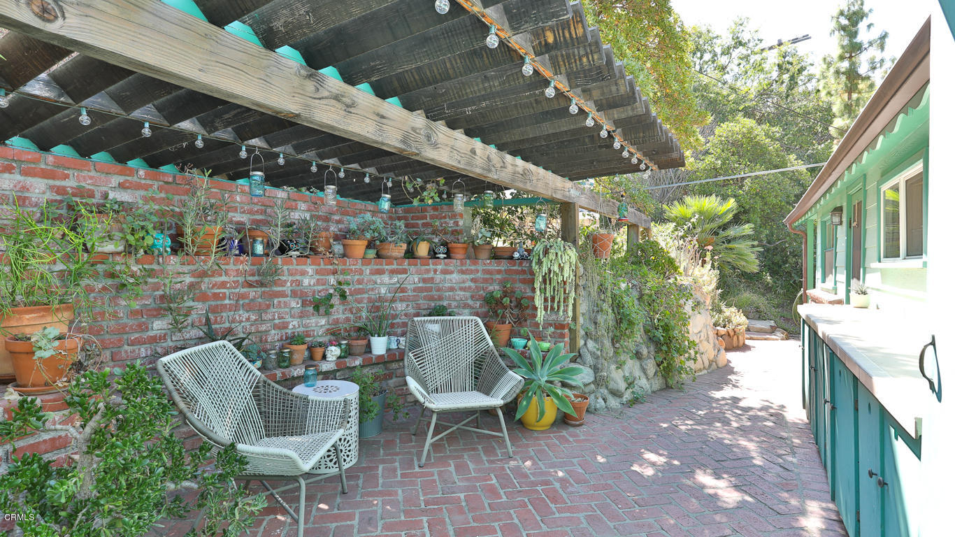 9525 Reverie Road Tujunga, CA 91042 - Photo 35 of 47 a view of a chairs and table in the patio