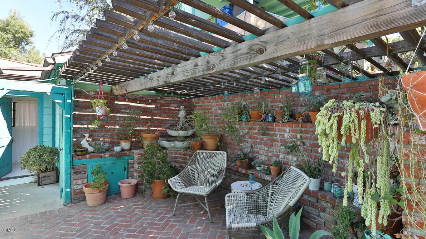 9525 Reverie Road Tujunga, CA 91042 - Photo 36 of 47 a view of a chairs and table in a patio