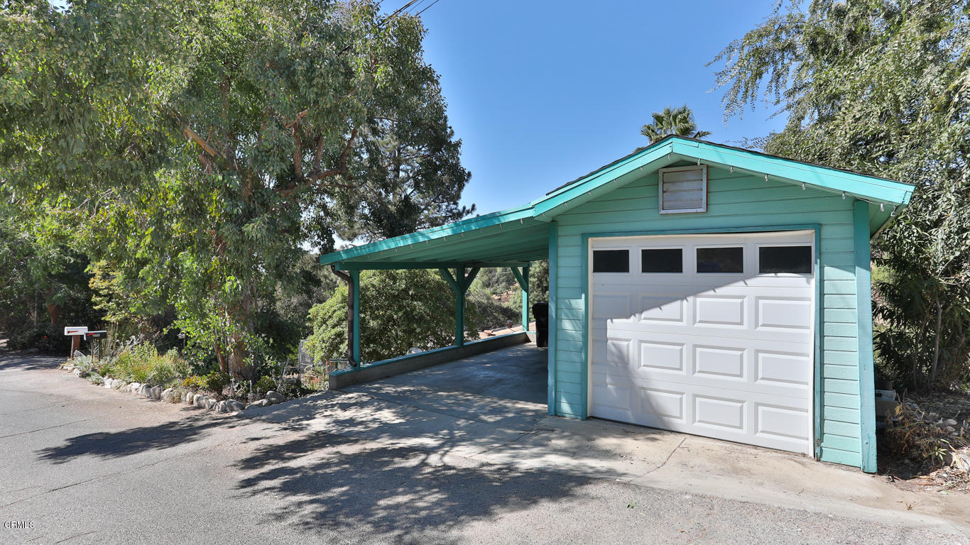 9525 Reverie Road Tujunga, CA 91042 - Photo 42 of 47 a front view of a house with a garden