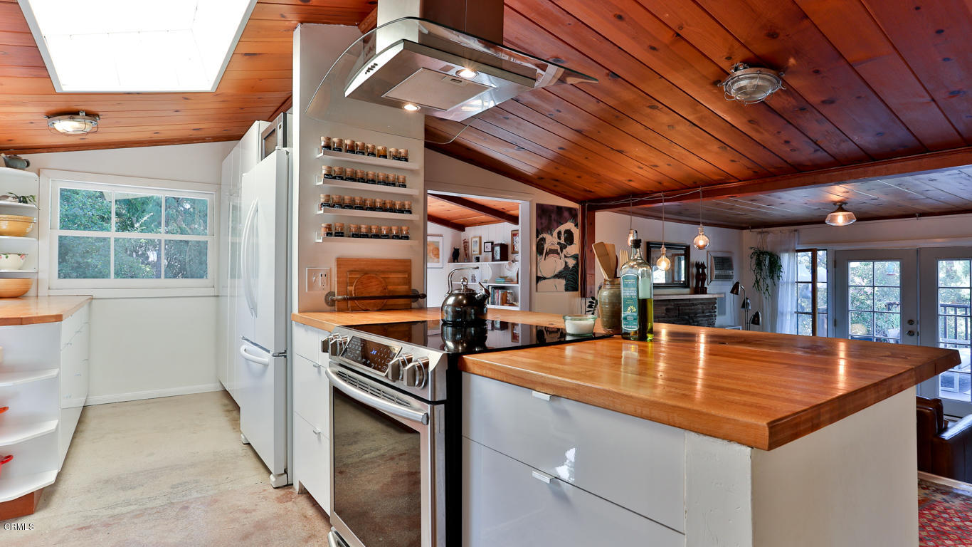 9525 Reverie Road Tujunga, CA 91042 - Photo 10 of 47 a view of a patio with table and chairs