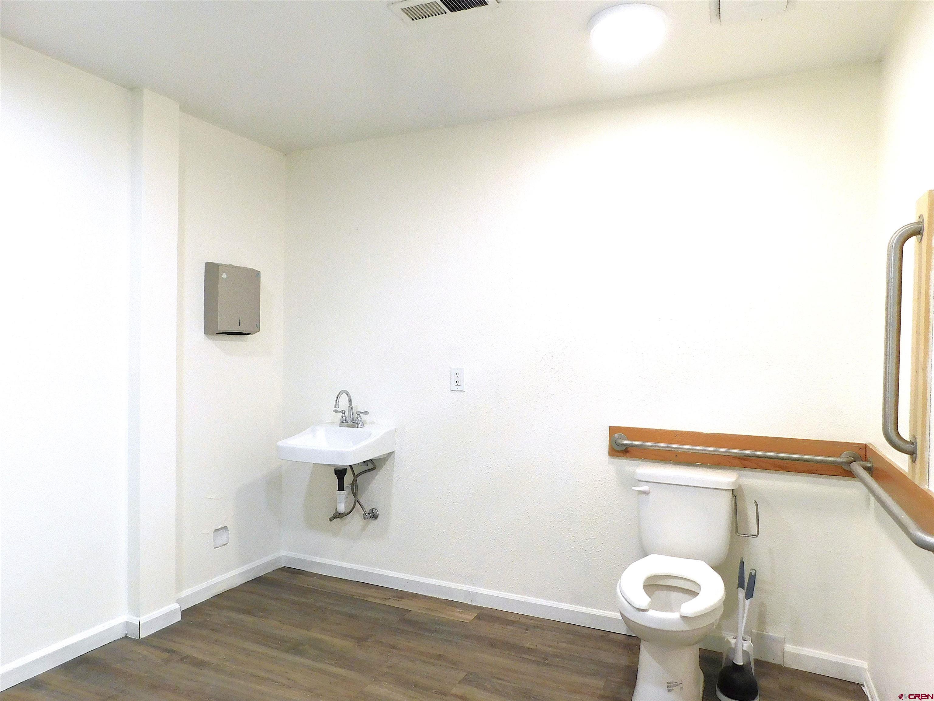 151 West 2nd Street Delta, CO 81416 - Photo 24 of 33 a bathroom with a toilet and a sink