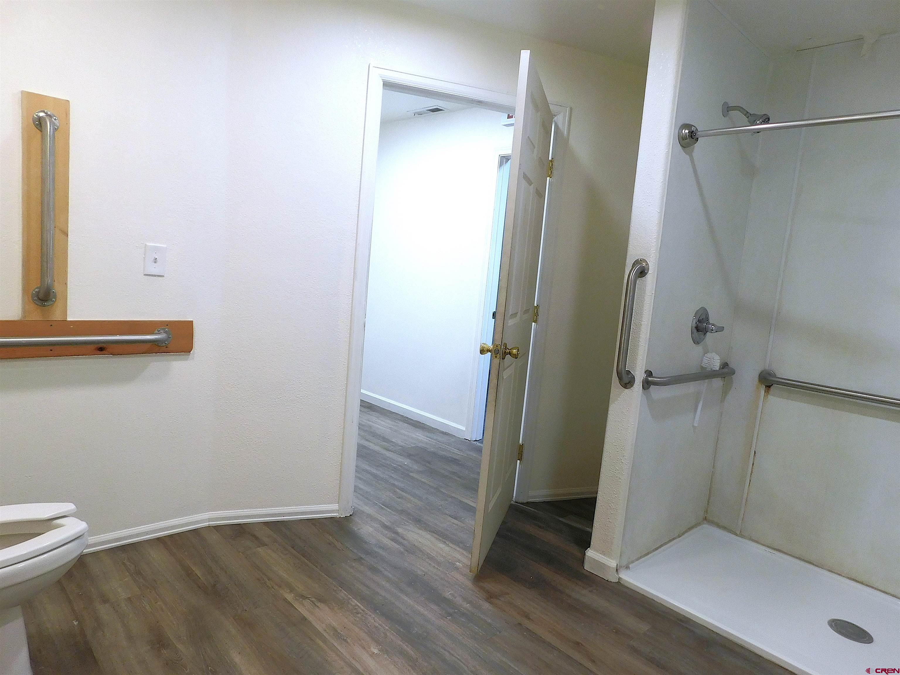 151 West 2nd Street Delta, CO 81416 - Photo 26 of 33 a view of bathroom with a toilet and a shower