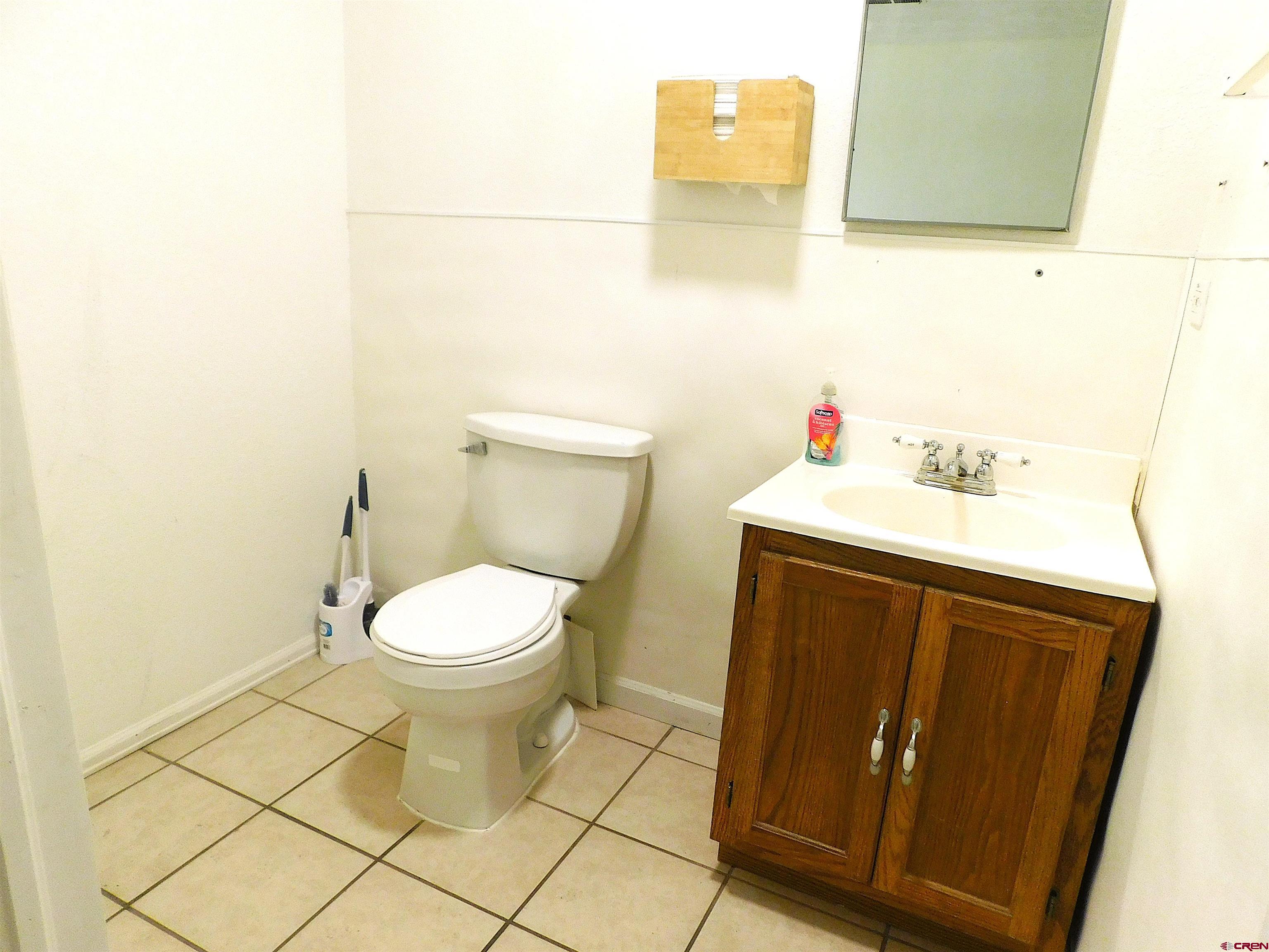 151 West 2nd Street Delta, CO 81416 - Photo 27 of 33 a bathroom with a toilet and a sink