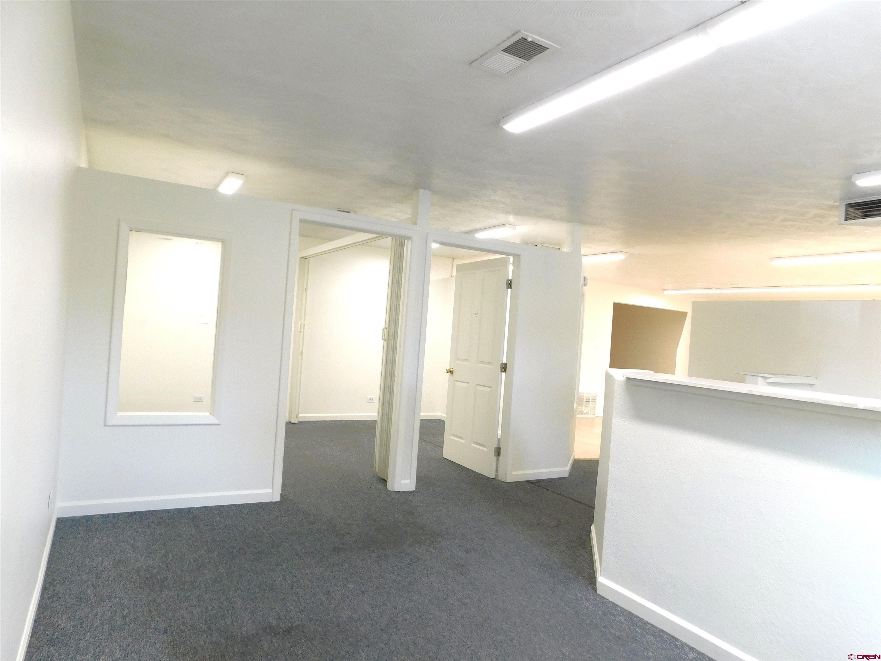 151 West 2nd Street Delta, CO 81416 - Photo 7 of 33 a view of an empty room with a window