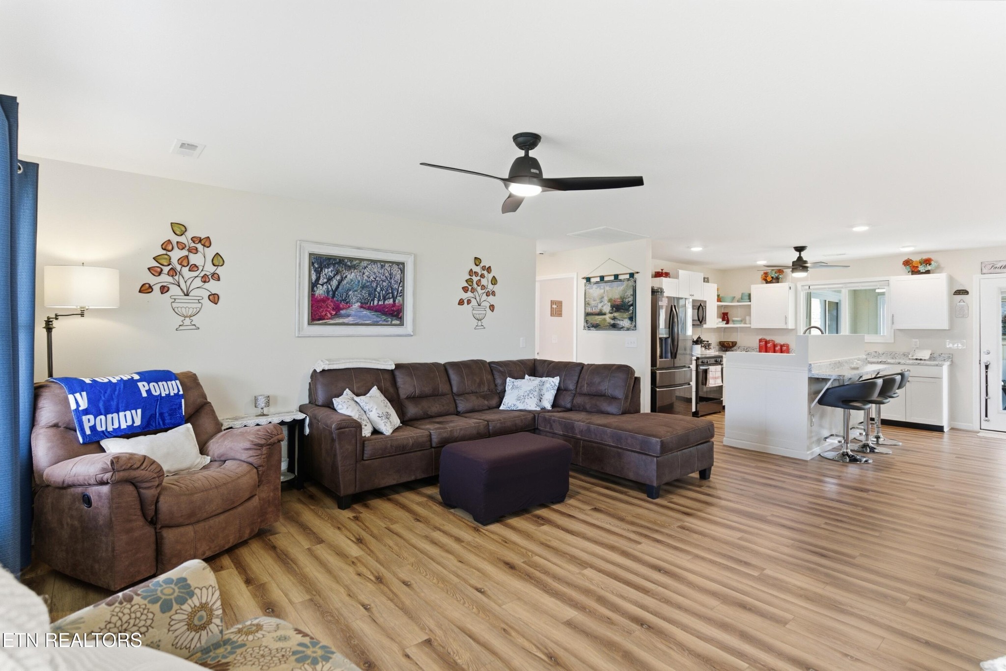 6911 Fairview Road Corryton, TN 37721 - Photo 8 of 30 a living room with furniture and a wooden floor