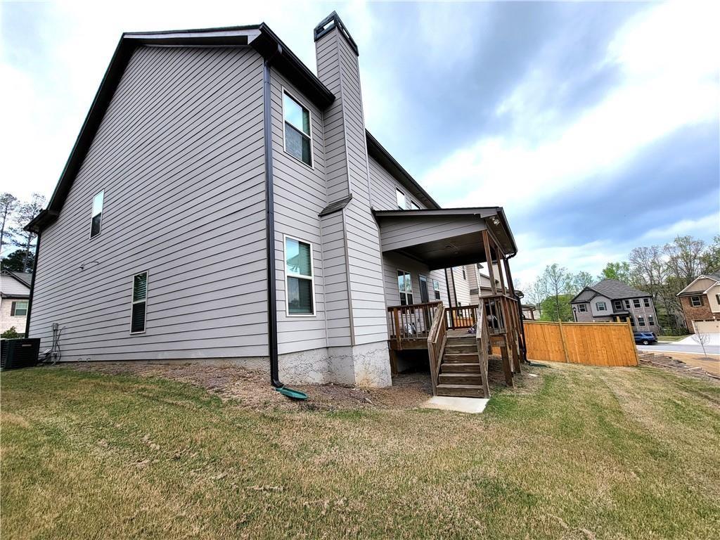 1866 Castleberry Drive Buford, GA 30518 - Photo 3 of 11 a view of a house with backyard and sitting area