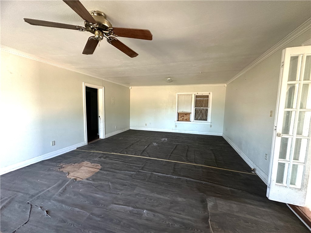 321 North Lee Street Mathis, TX 78368 - Photo 8 of 11 a view of an empty room with a window