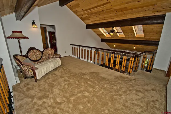 a view of a livingroom with furniture