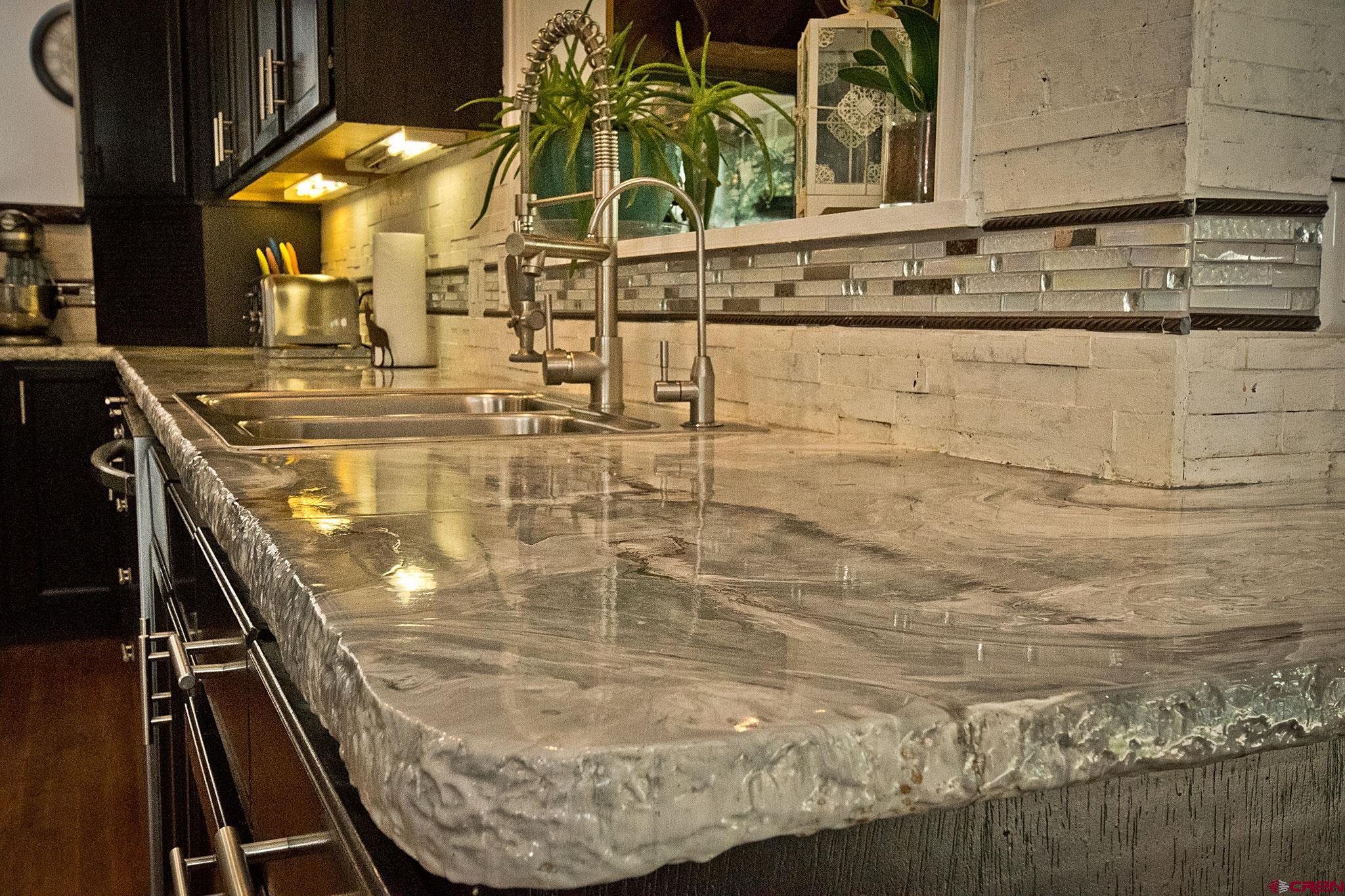 808 Weber Drive Alamosa, CO 81101 - Photo 10 of 44 a view of a swimming pool