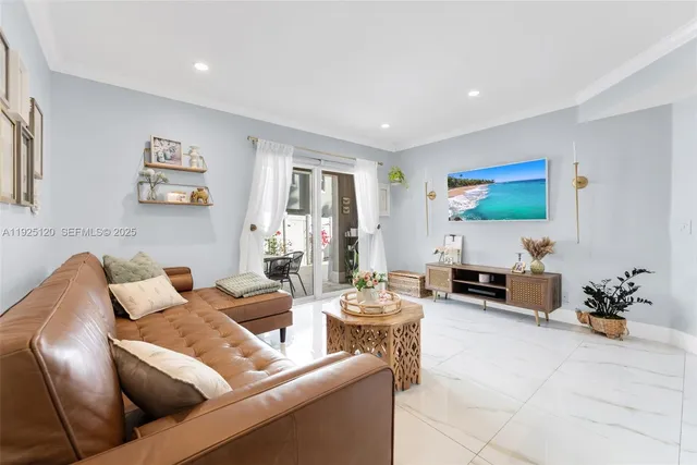 a living room with furniture and a couch