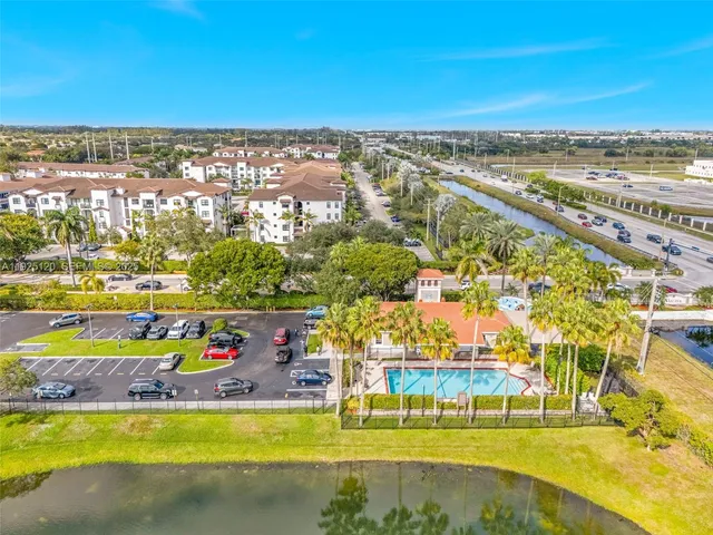 a view of a swimming pool with an ocean view