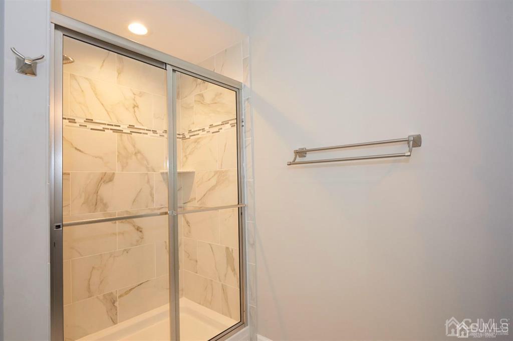 22 Green Tree Circle Hazlet, NJ 07730 - Photo 17 of 39 a bathroom with a shower