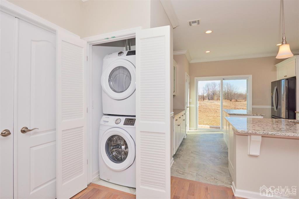 22 Green Tree Circle Hazlet, NJ 07730 - Photo 18 of 39 a view of a kitchen with washer and dryer