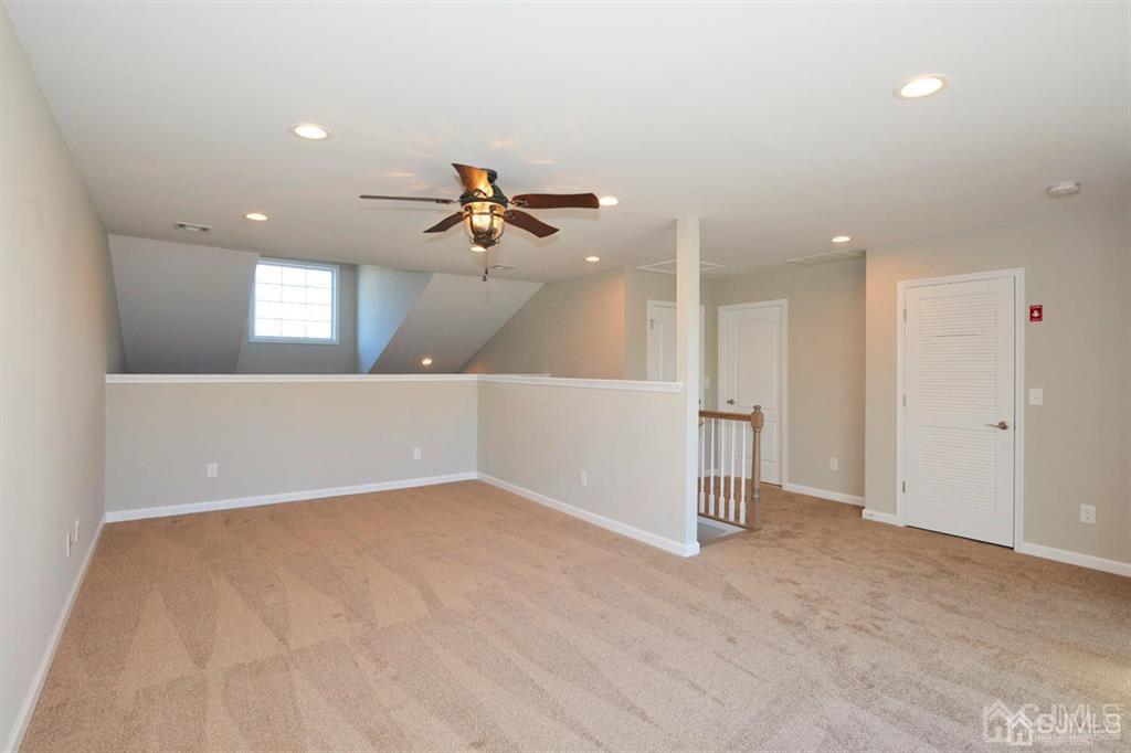 22 Green Tree Circle Hazlet, NJ 07730 - Photo 19 of 39 a view of an empty room