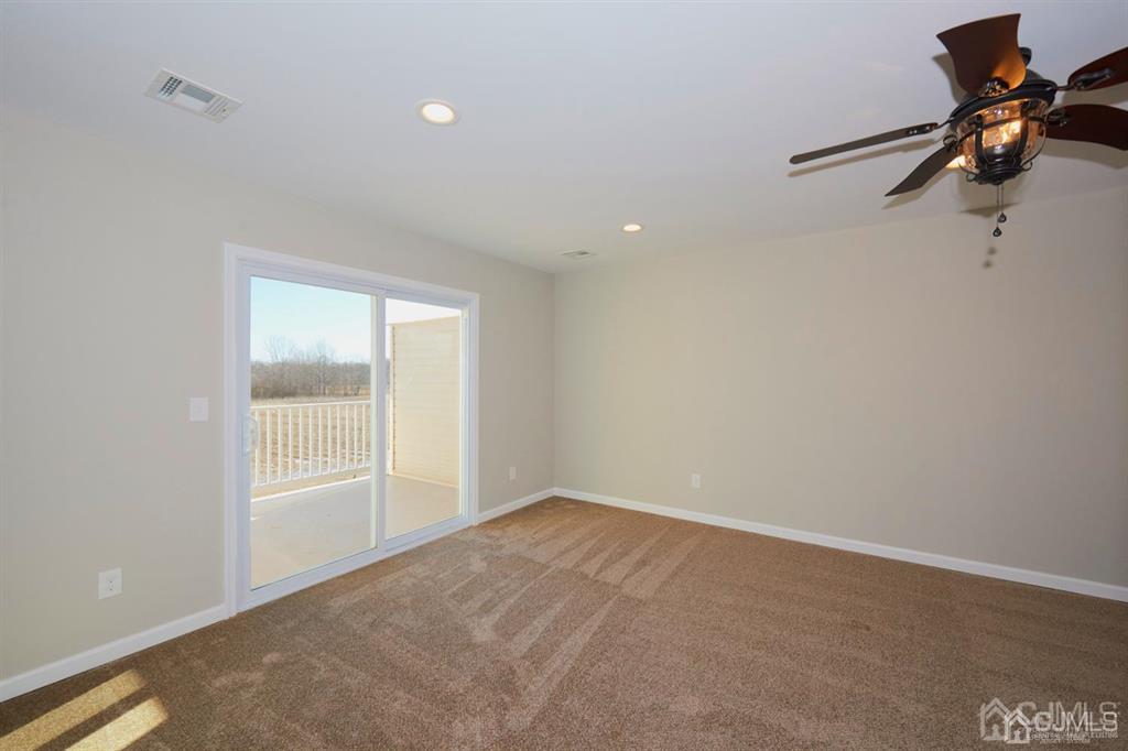 22 Green Tree Circle Hazlet, NJ 07730 - Photo 21 of 39 wooden floor in an empty room with a window