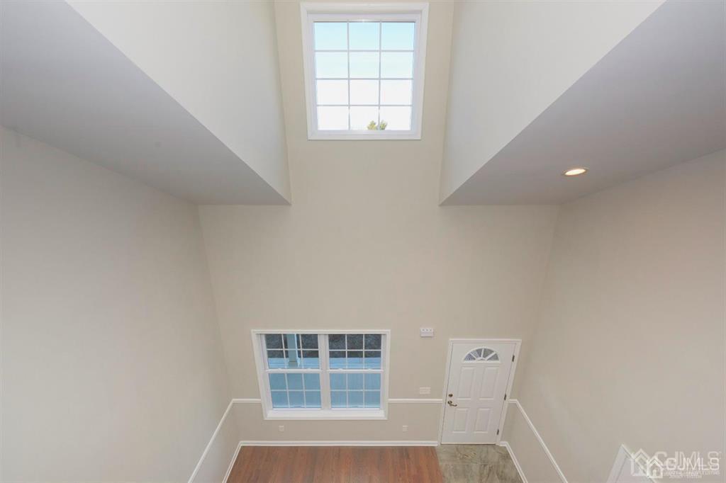 22 Green Tree Circle Hazlet, NJ 07730 - Photo 30 of 39 an empty room with windows