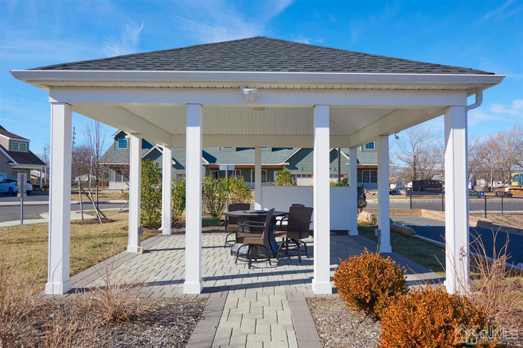 22 Green Tree Circle Hazlet, NJ 07730 - Photo 37 of 39 a view of living room and patio