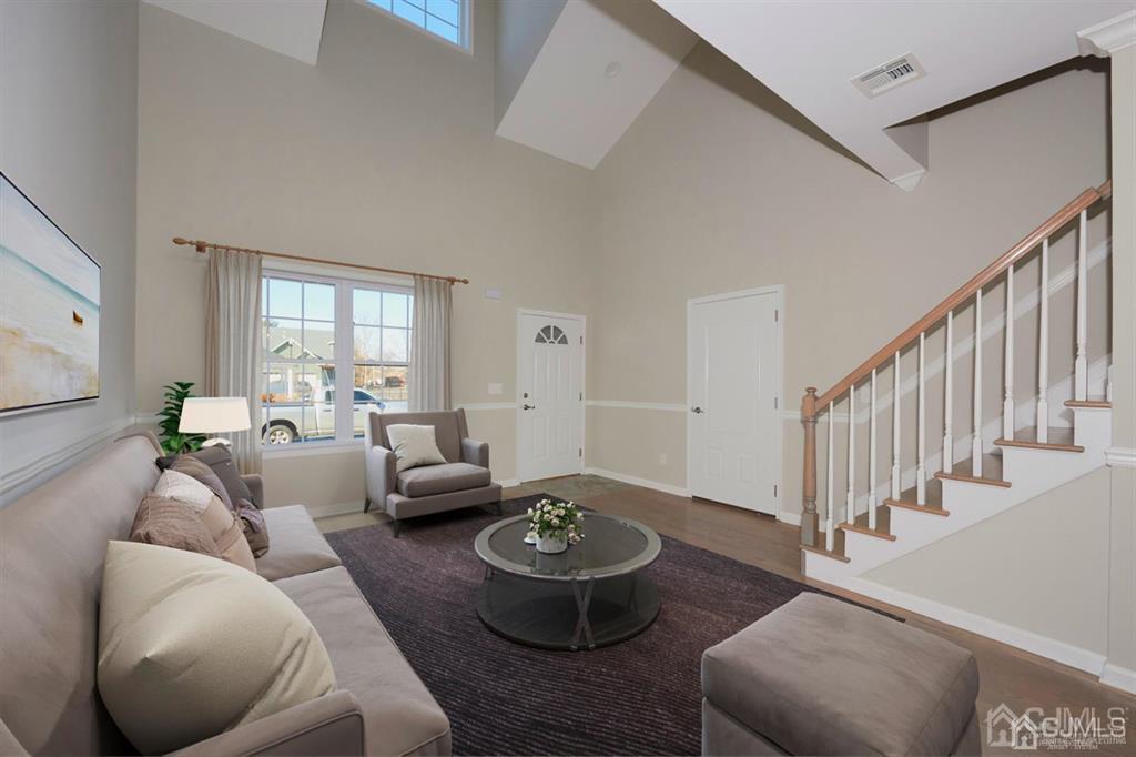 22 Green Tree Circle Hazlet, NJ 07730 - Photo 8 of 39 a living room with furniture and a large window