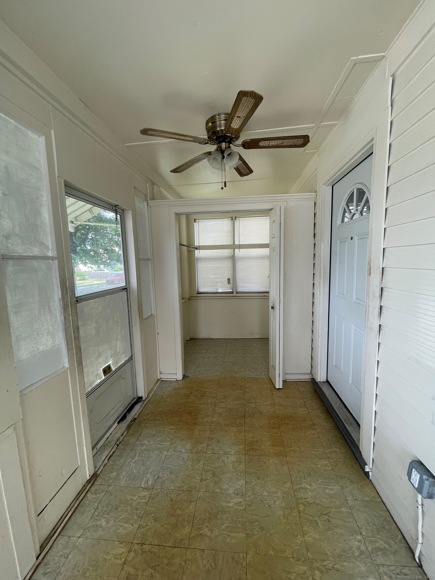 22 Fairview Street Milford, CT 06460 - Photo 24 of 28 wooden floor in an empty room with a window