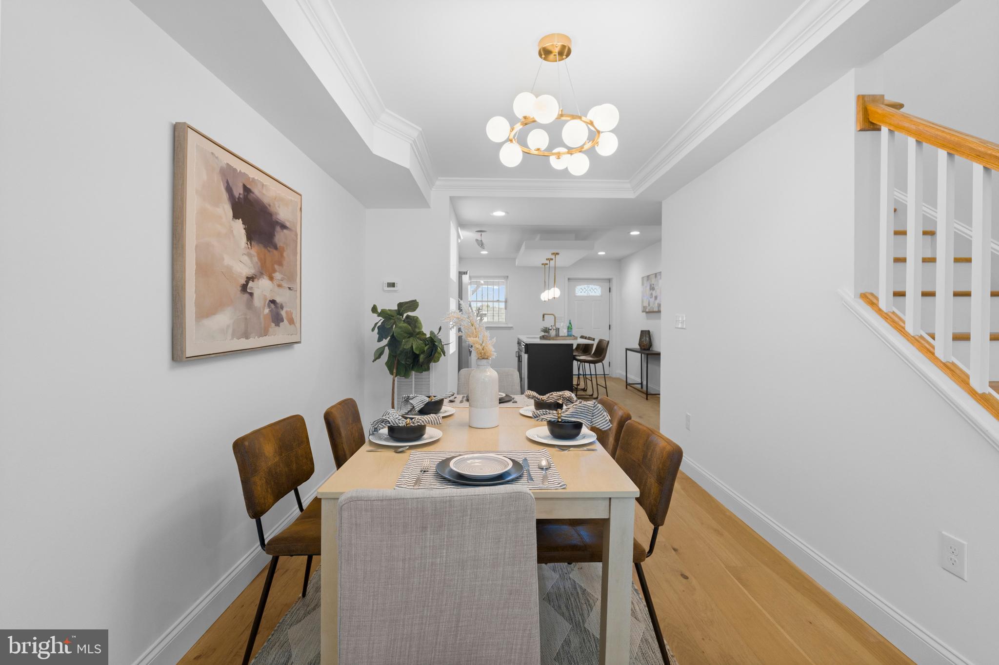2516 Federal Street Baltimore, MD 21213 - Photo 13 of 40 a view of a dining room with furniture and chandelier