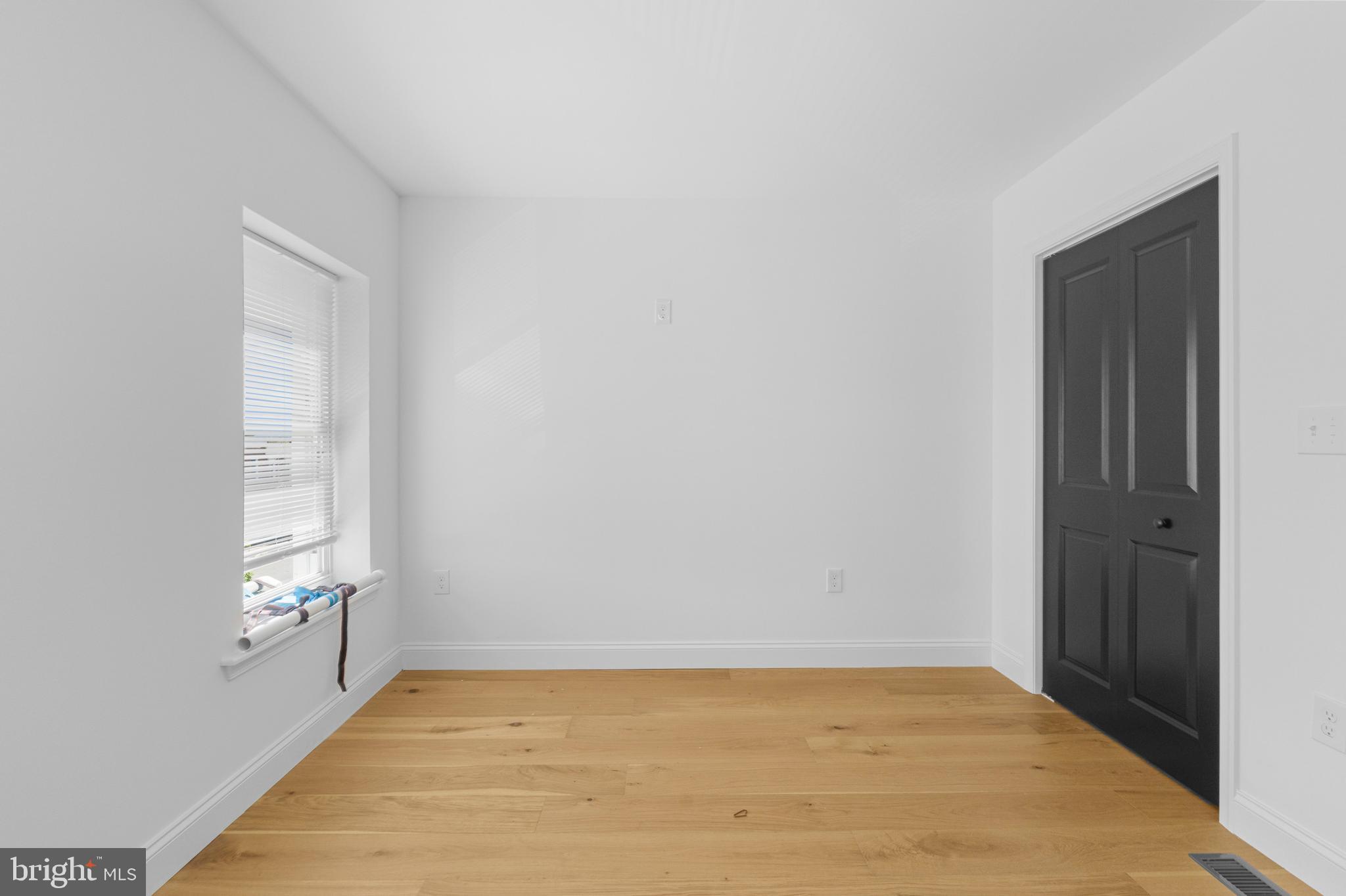 2516 Federal Street Baltimore, MD 21213 - Photo 24 of 40 a view of an empty room and window