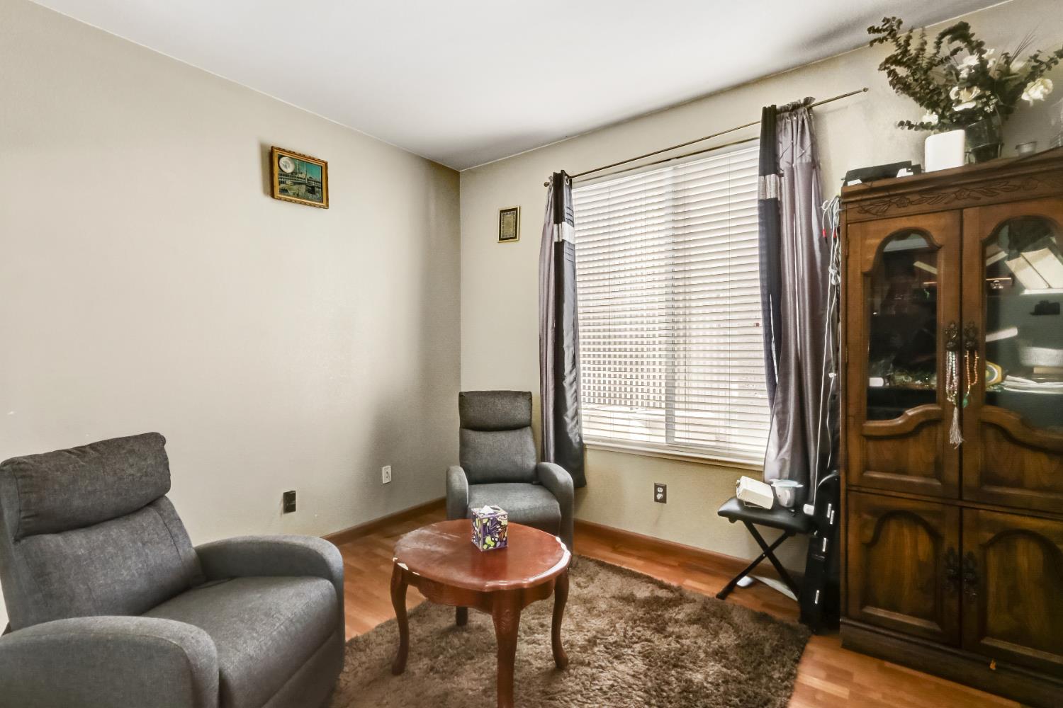 9820 Spring View Way Elk Grove, CA 95757 - Photo 25 of 49 a living room with furniture and a window