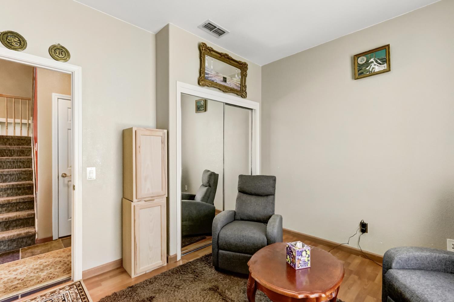 9820 Spring View Way Elk Grove, CA 95757 - Photo 27 of 49 a living room with furniture and a window