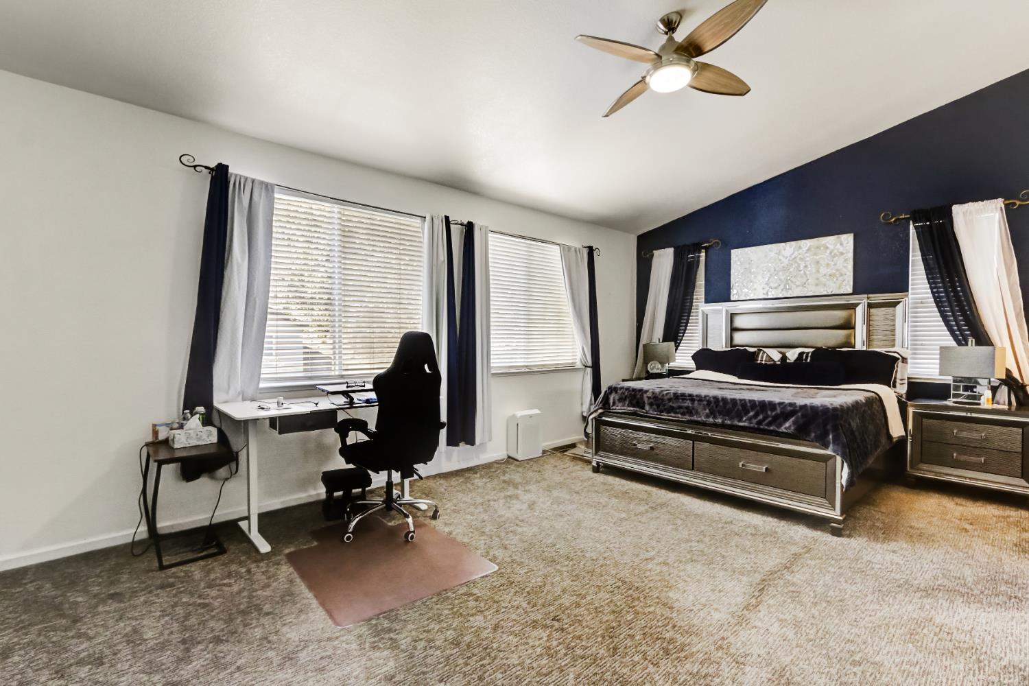 9820 Spring View Way Elk Grove, CA 95757 - Photo 29 of 49 a view of a workspace with furniture and a window