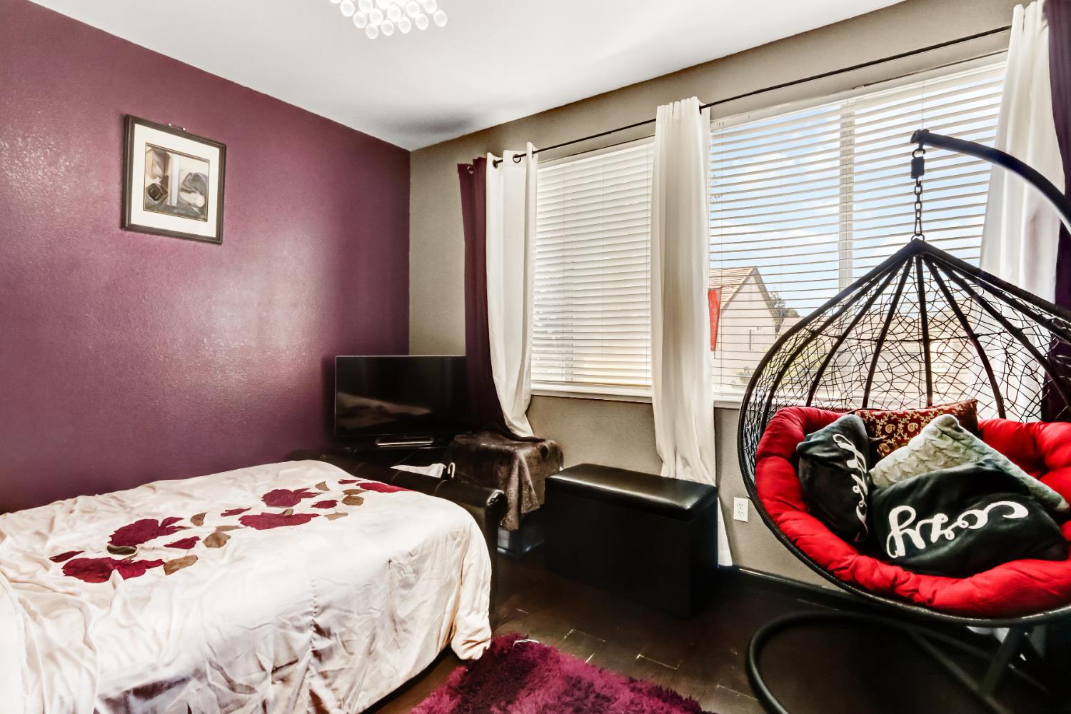 9820 Spring View Way Elk Grove, CA 95757 - Photo 35 of 49 a bedroom with a bed and a window