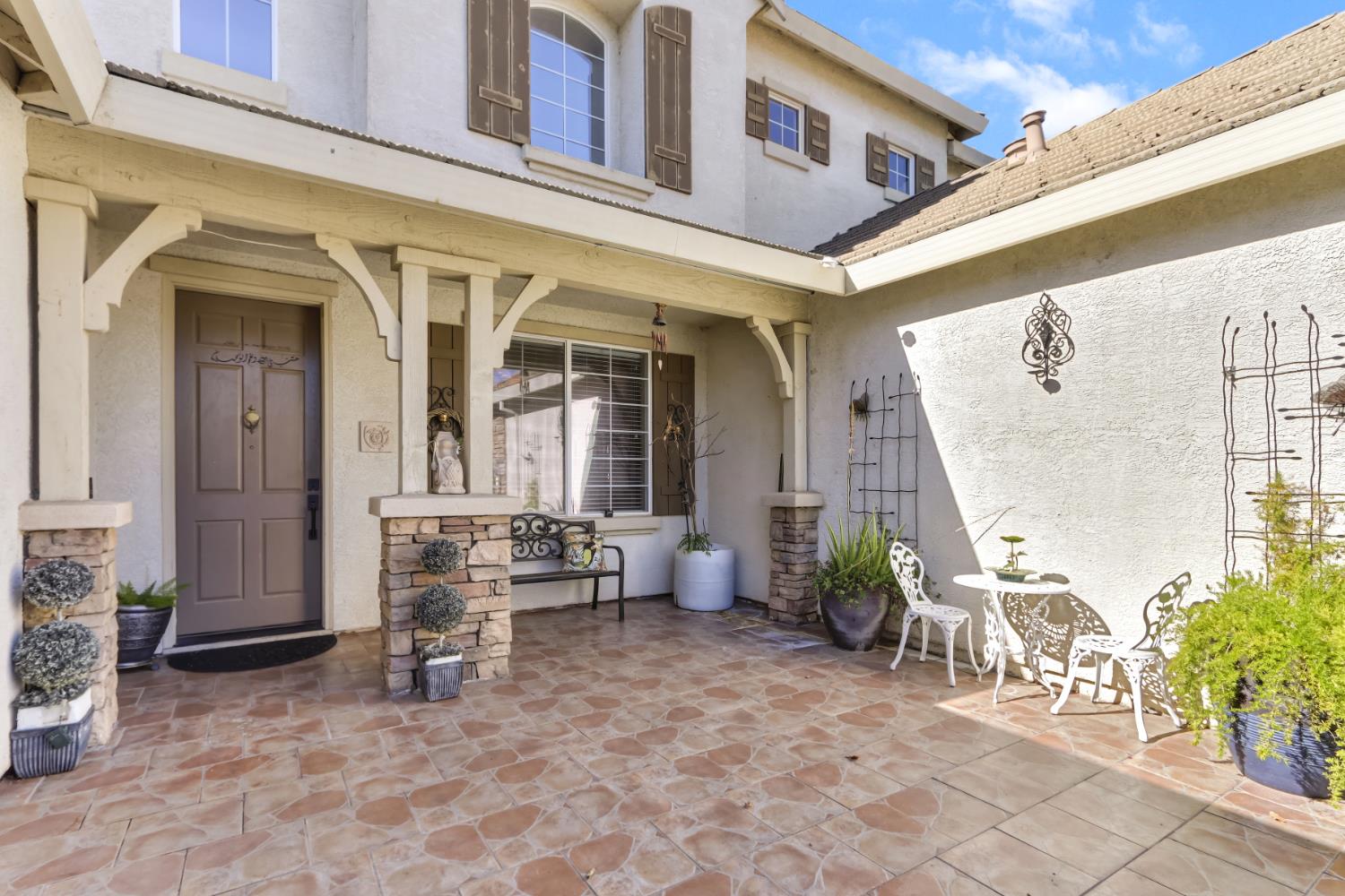 9820 Spring View Way Elk Grove, CA 95757 - Photo 4 of 49 a view of a building with outdoor seating space