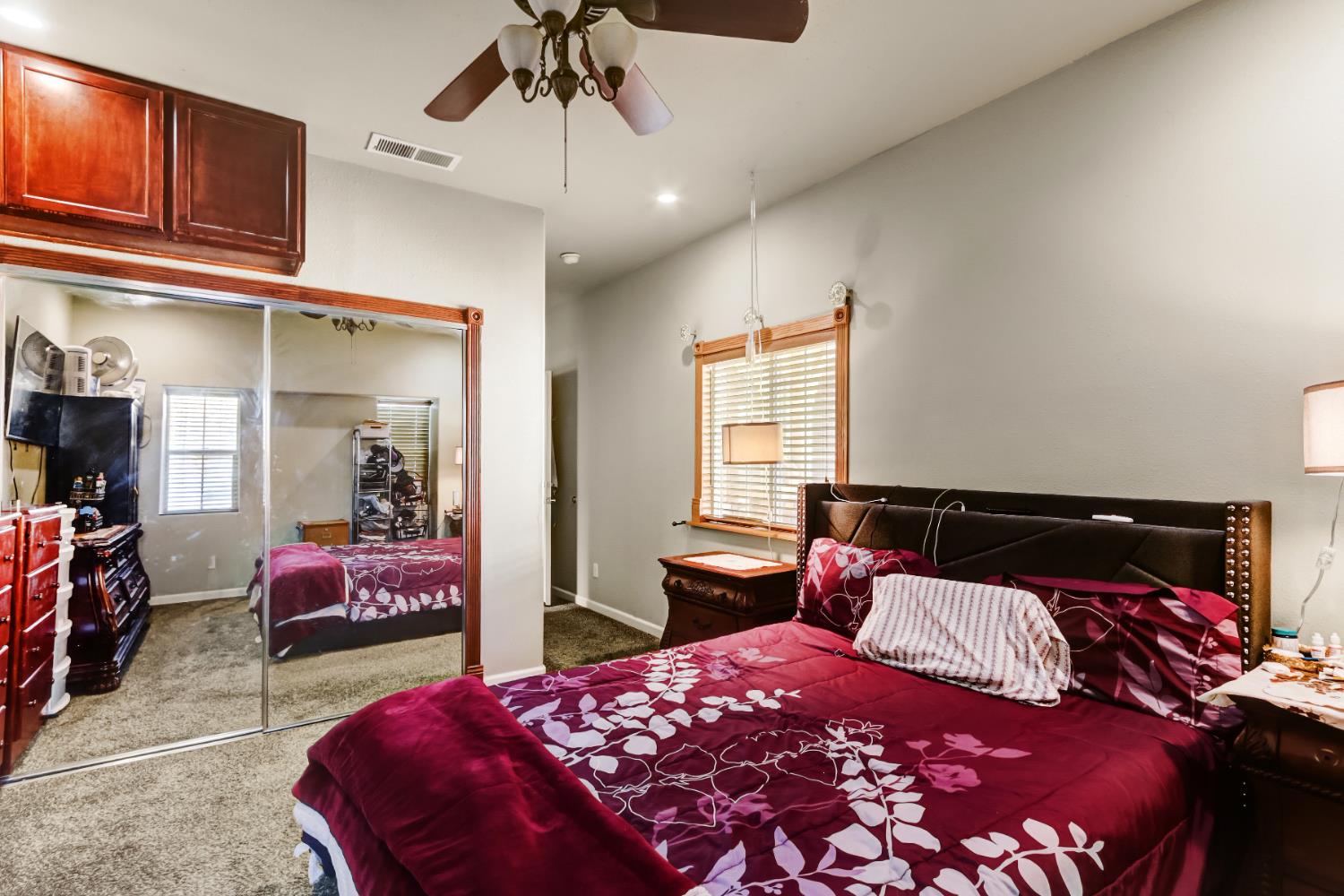 9820 Spring View Way Elk Grove, CA 95757 - Photo 42 of 49 a bedroom with a bed and wooden floor