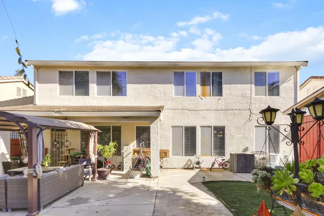 a view of a building with sitting area