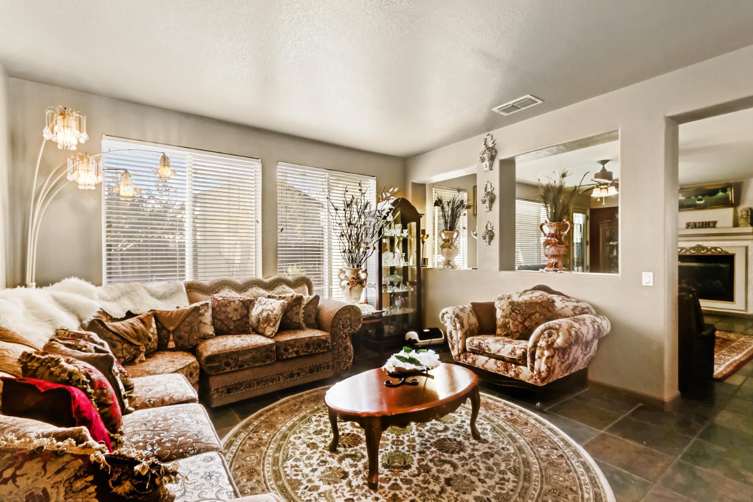 9820 Spring View Way Elk Grove, CA 95757 - Photo 9 of 49 a living room with furniture and a large window